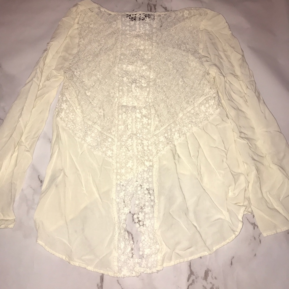 Cream long sleeve top with Detailed back